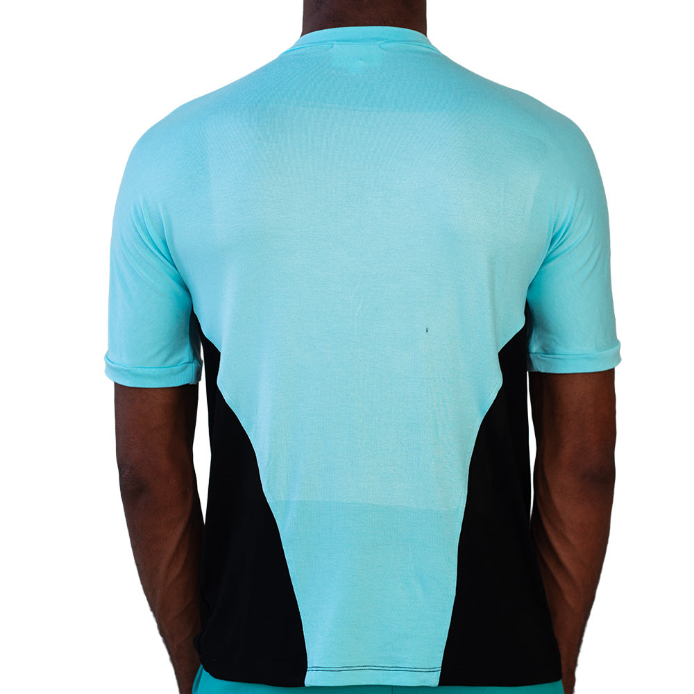 Light blue Mariano Velocity ‘M’ Tee with red shoulders, black logo, and sporty tailored fit.