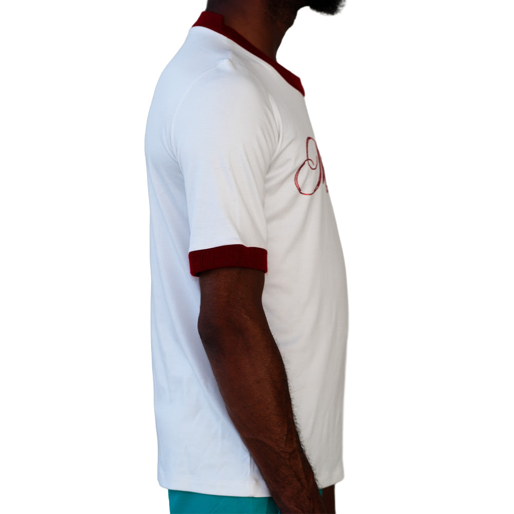 White Mariano tee with maroon trim and script logo across the chest