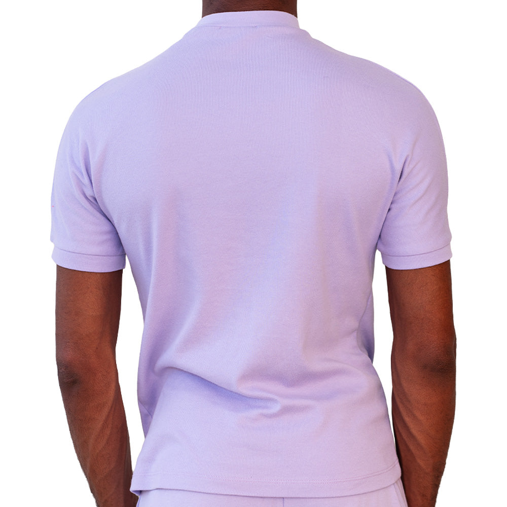 Lavender Mariano tee with white logo sleeves and minimalist crewneck design.
