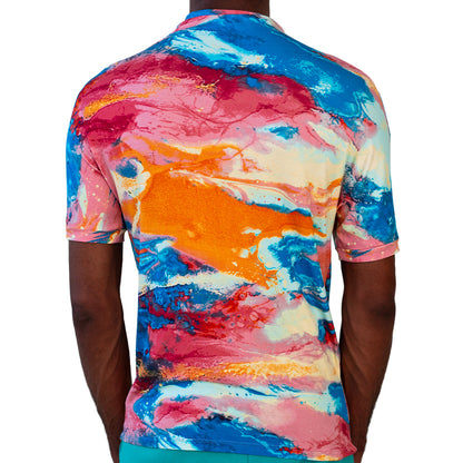 Multicolor Mariano performance tee with watercolor print in blue, pink, and yellow tones.
