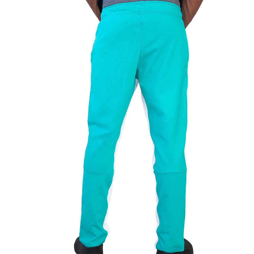 Turquoise Mariano track pants with red and blue bird prints and white side panels in a slim athletic fit.
